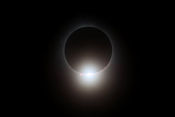 The total solar eclipse is seen before the game between the Cleveland Guardians and the Chicago White Sox at Progressive Field on April 08, 2024 in Cleveland, Ohio. Cleveland is in the "path of totality" for today's total solar eclipse.